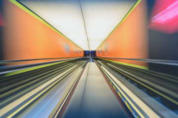 Escalator in motion blur on the subway station