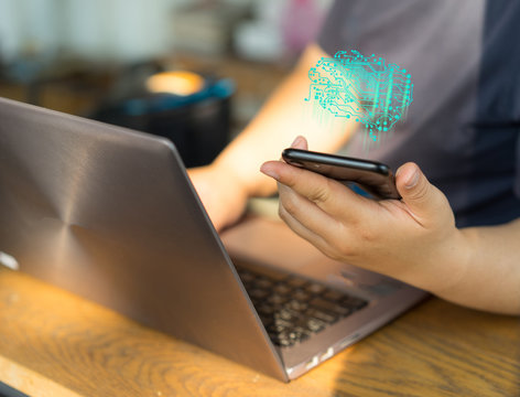 Woman hands work on labtop and smart phone.