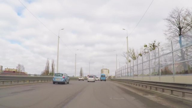 Drivers pov vehicle driving along the streets city