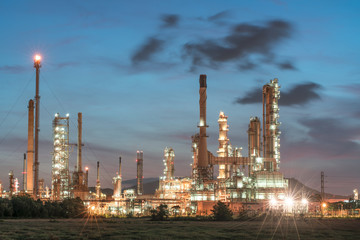 Oil refinery at dramatic twilight
