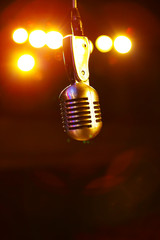 Retro Shure microphone in the stage lights