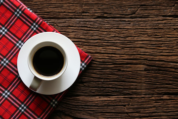 Hot coffee on wood table backdrop.Flat lay.Copy space