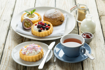 old school style tea at five afternoon service set cake sweet traditional table hotel cheesecake sugar pot china cup