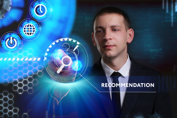 Business, Technology, Internet and network concept. Young businessman working on a virtual screen of the future and sees the inscription: Recommendation