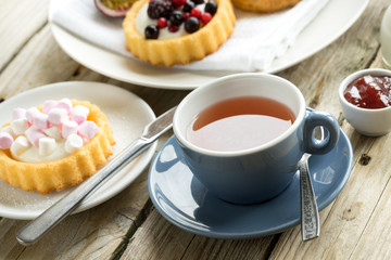 old school style tea at five afternoon service set cake sweet traditional table hotel cheesecake sugar pot china cup