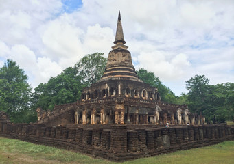 Fototapeta na wymiar Ancient buddha statue. Sukhothai Historical Park, Sukhothai Province, Thailand