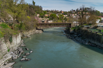 Fototapeta na wymiar View on the river Rioni in Kutaisi, Georgia. Vivid image