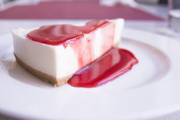 Cheesecake with strawberry syrup