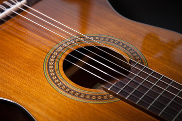 Obraz premium Fragment of an acoustic guitar