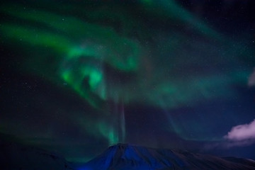 The polar Northern lights in the mountains of Svalbard, Longyearbyen, Spitsbergen, Norway wallpaper