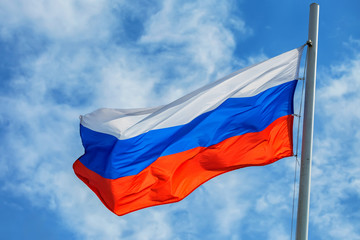 Russian flag on sky and cloud background