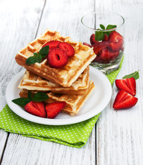belgian waffles with strawberries and mint