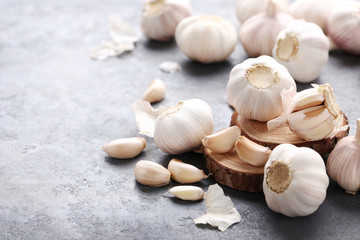 Garlic on the grey wooden table