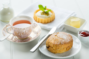old school style tea at five afternoon service set cake sweet traditional table hotel cheesecake sugar pot china cup