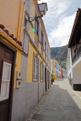 AGULO, LA GOMERA, SPAIN: Cobbled street with colorful houses inside the village of Agulo