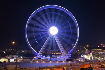 HONG KONG - AUGUST 04: big ferris wheel is located at Hong Kong side - long exposure August 04,...