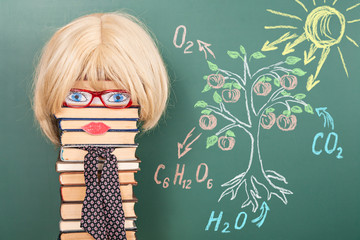 The teacher demonstrates the principle of photosynthesis