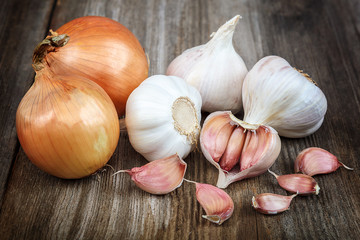 Fresh garlic on a wooden background