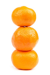 Fruits of a tangerine on a white background.