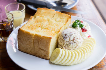 Toast and ice cream and banana dessert in cafe
