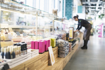 Female owner working in supermarket