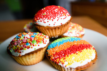 Holiday cupcakes with raisins on the plate