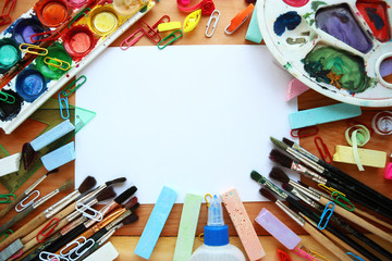 Stationery on a wooden background