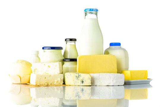 Dairy Products with Cheese and Milk on White Background