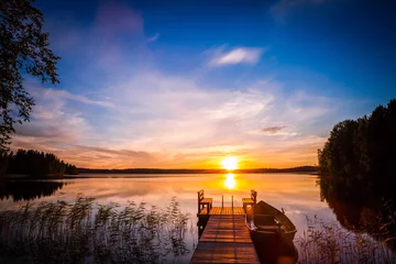 Foto op Canvas Zonsopgang boven de vissteiger aan het meer in Finland © nblxer