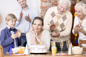 Woman making birthday wish