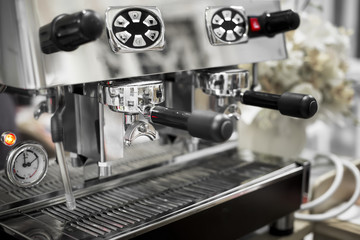 Fototapeta premium Close-Up of coffee machine making a cup of coffee in restaurant