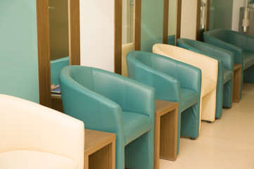 Empty Blue and ivory chairs in waiting room, hall. Selective focus, close up