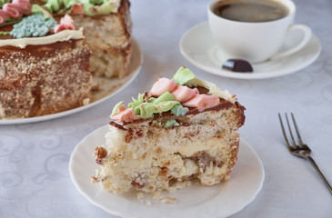 Fototapeta na wymiar Delicious cake dessert with cream, walnuts and coffee