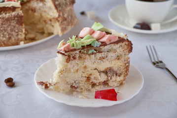 Delicious cake dessert with cream, walnuts and coffee