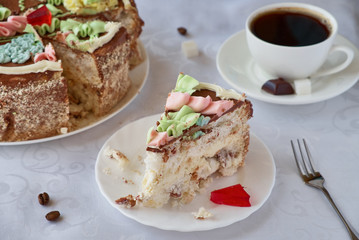 Delicious cake dessert with cream, walnuts and coffee