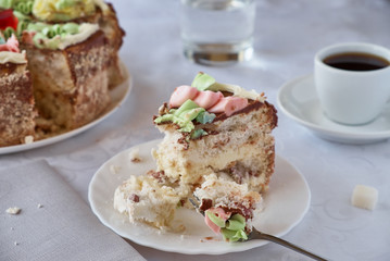 Delicious cake dessert with cream, walnuts and coffee