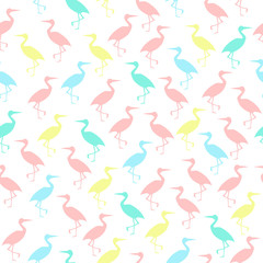 Colored silhouettes of storks seamless pattern. Irregular. Pink, blue green and yellow colors