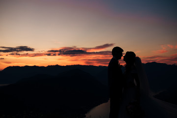 Silhouettes at sunset on Mount Lovcen in Montenegro