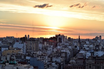 Fototapeta na wymiar An orange sunset in a big city