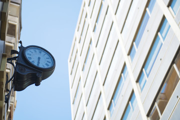 City landscape with clocks on front