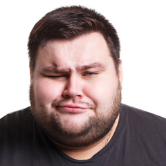 Fototapeta premium Man face isolated, disgust, negative emotion