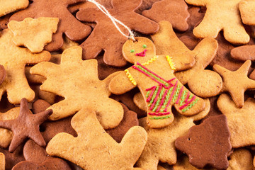 Homemade christmas gingerbreads and cingerbread mans, Christmas or New Year background