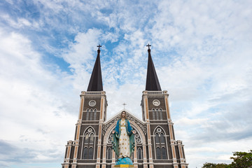 Fototapeta na wymiar The Blessed Virgin Mary in front of the Roman Catholic Diocese, public place in Chanthaburi, Thailand.