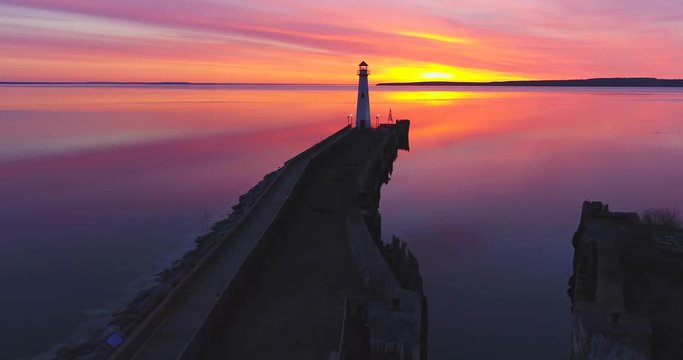 Wawatam Lighthouse in the stunning light of dawn, Saint Ignace, Upper Michigan. Aerial flyby.