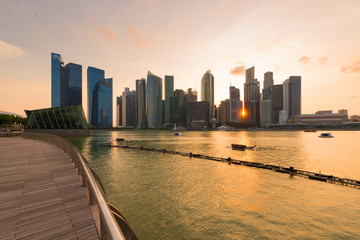 Singapore business downtown in front of marina bay district while sunset.