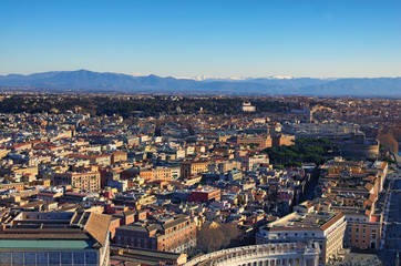 View to amazing cityscape of Rome from the top of dome Saint Peter's Basilica. Winter morning. Rome. Italy