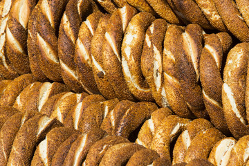 Background with Turkish bagels simit, close-up