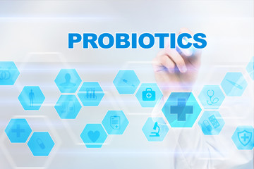 Medical doctor drawing probiotics on the virtual screen.