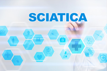 Medical doctor drawing sciatica on the virtual screen.