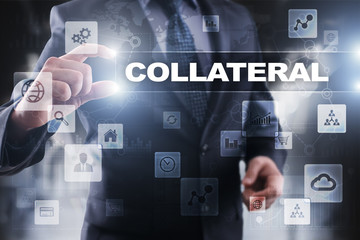 Businessman selecting collateral on virtual screen.